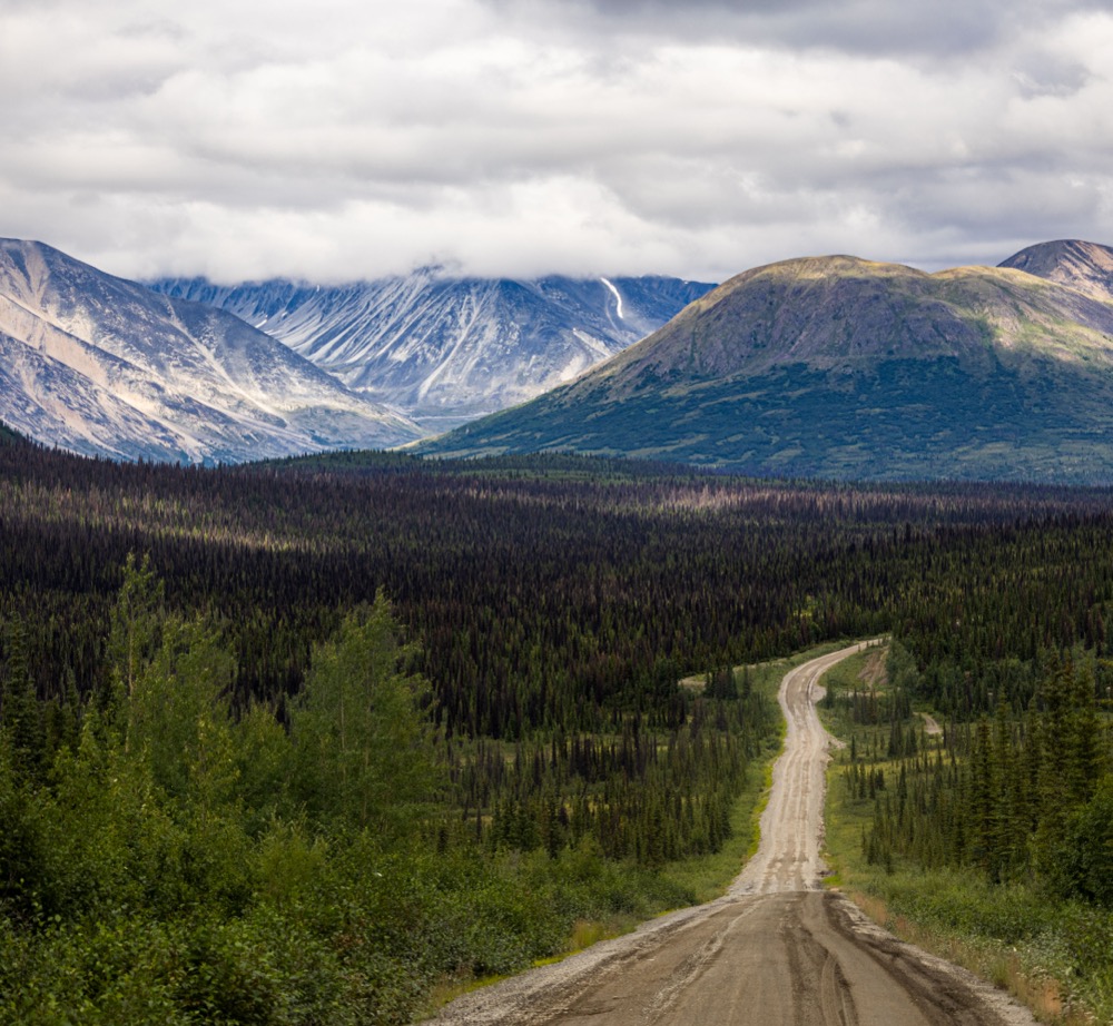 Mountain valley and gravel road